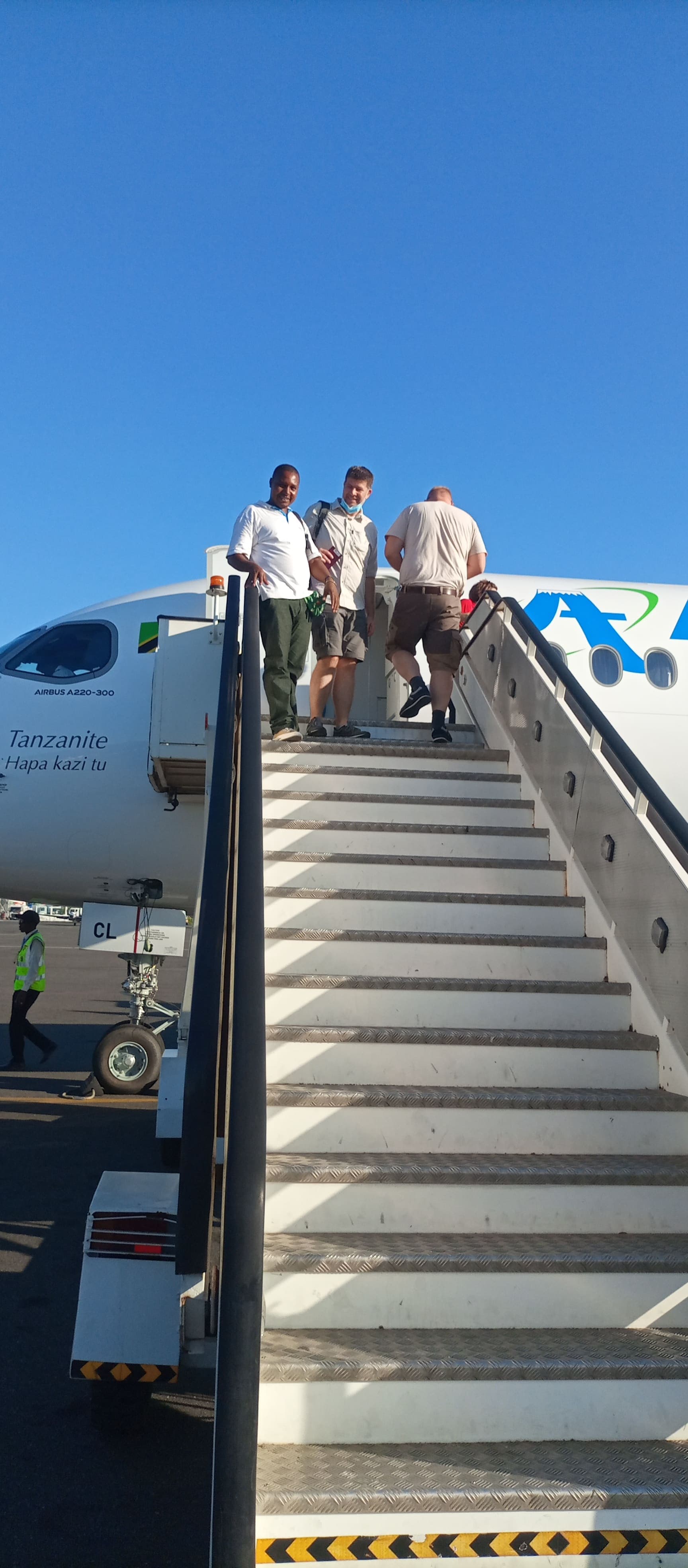 Trust Tours guests boarding a domestic flight, with logistics handled end to end